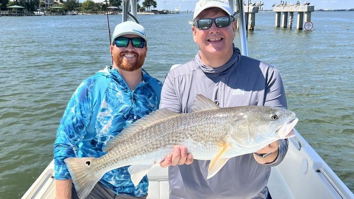 Fishing Charter Catching Redfish
