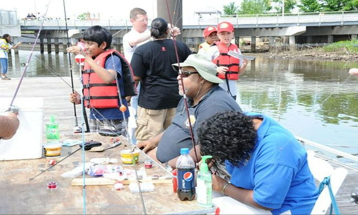 people gather around during the National Fishing and Boating Week