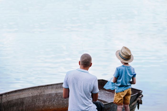 boy-with-his-father-fishing-lake.jpg