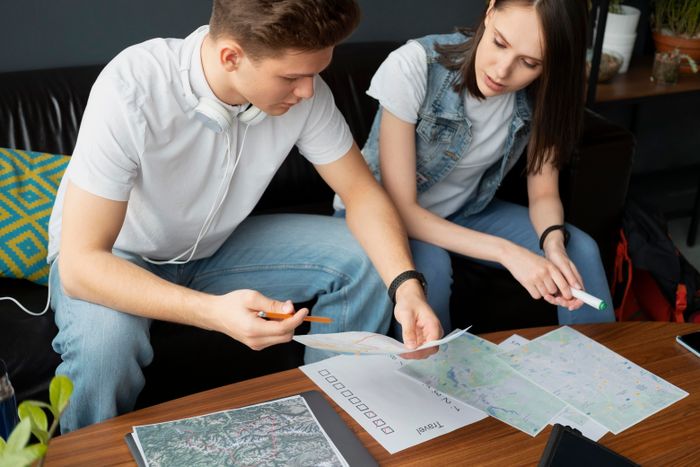 close-up-people-planning-trip-together.jpg