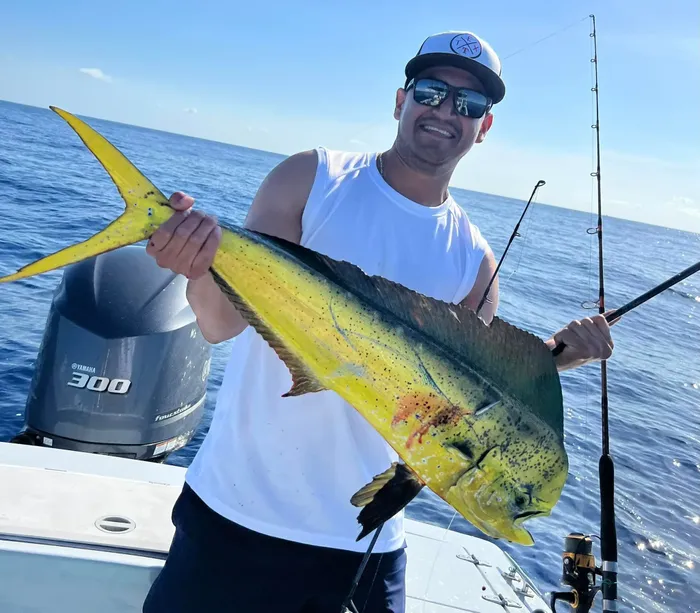 Man holding Mahi-Mahi