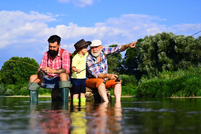fishing-little-boy-fly-fishing-lake-with-his-father-grandfather-senior-man-fishing-with-son.jpg