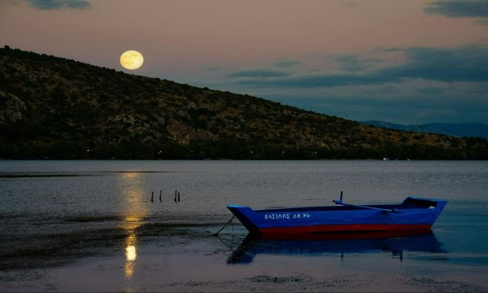 blue boat lake full moon