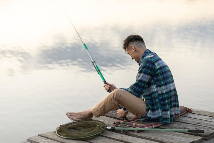 full-shot-young-man-fishing (1).jpg