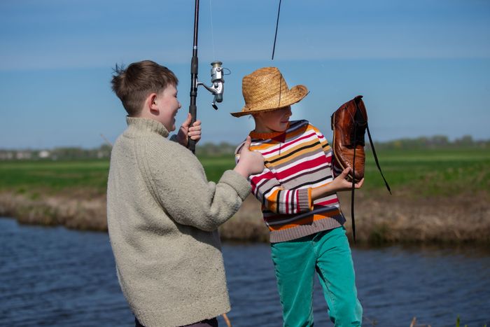 funny-fishing-two-boys-friends-hooked-old-shoe-with-fishing-rod-are-laughing (1).jpg
