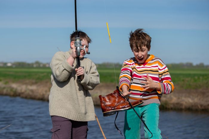funny-fishing-two-boys-friends-hooked-old-shoe-with-fishing-rod-are-laughing.jpg