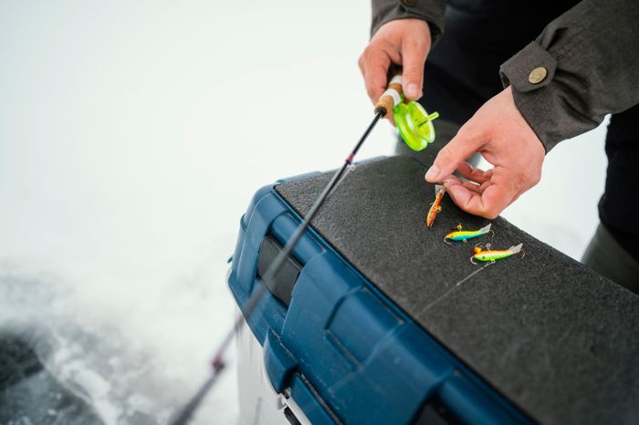 man-winter-clothes-fishing-alone-outside.jpg