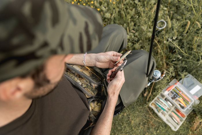 person-fixing-fish-hook (3).jpg