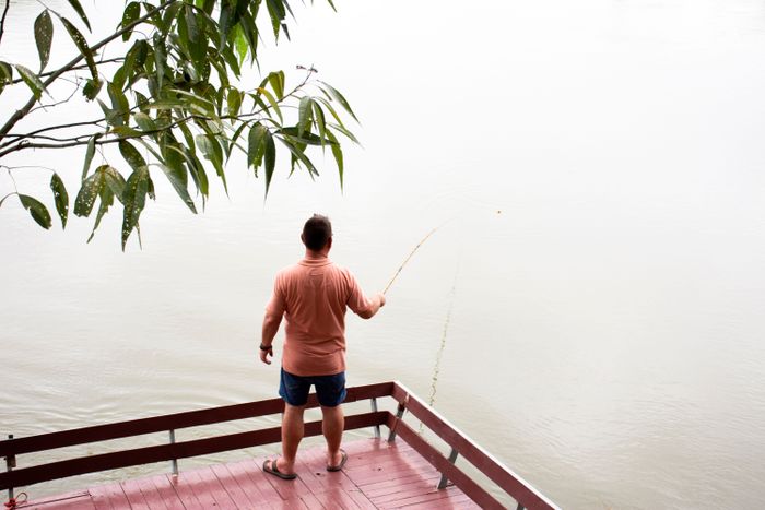 travelers-foreigner-stand-fishing-angling-riverside-mae-khlong-meklong-river-ban-pong-evening-ratchaburi-thailand.jpg