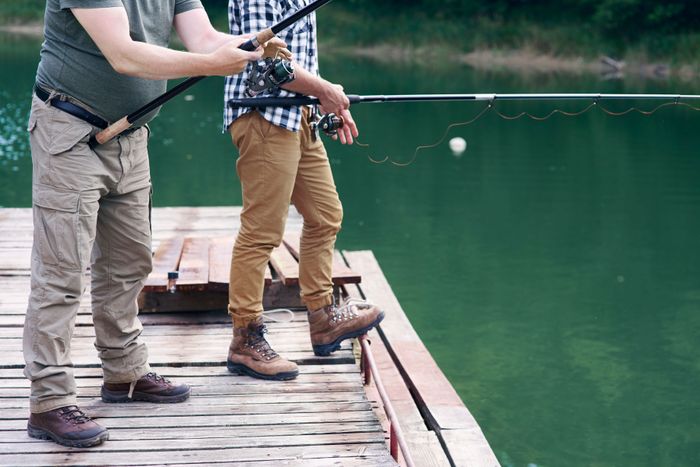 unrecognizable-men-with-fishing-rod-fishing (1).jpg