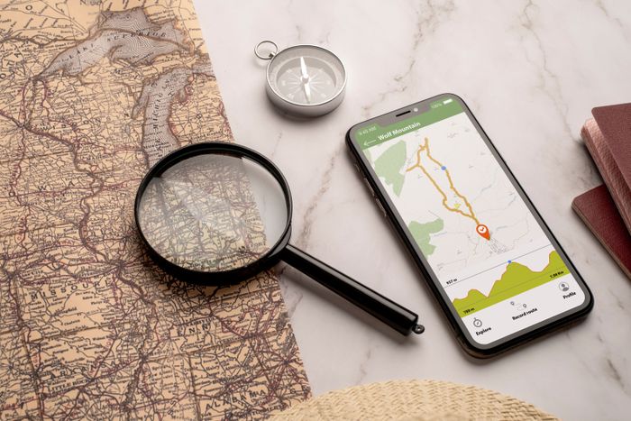 view-world-travel-map-with-smartphone-magnifying-glass.jpg