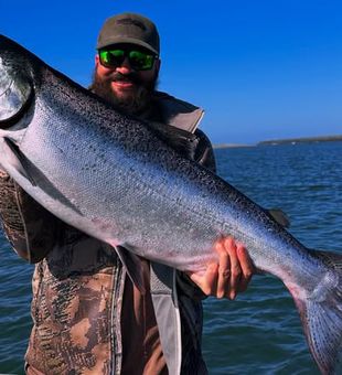 Anderson salmon fishing offers the perfect blend of scenic river views and thrilling action on the water.