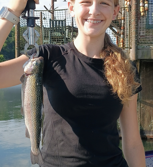 Stormy skies can't stop this 16-inch rainbow trout!