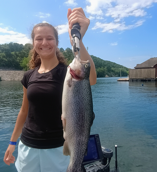 Huge 28-inch Rainbow Trout landed while storm clouds gather!