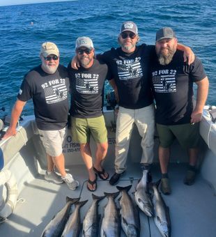 Big fish, bigger fight — salmon style.
