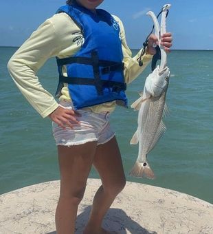 Our Captain welcomes your kids! Redfish Fishing