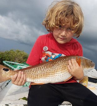 Spring Hill redfish making memories on the water!
