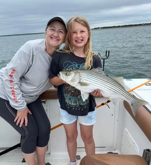 Proud moment with a chunky Lake Buchanan striper!