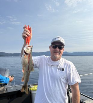 Fishing in Carnelian Bay, CA hits different when the lake is calm and the lines are tight.