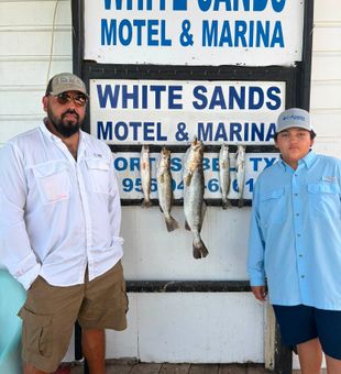 Proud Speckled Trout Catch at White Sands Marina