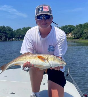 Awesome redfish catch on the boat — perfect day for inshore fishing!