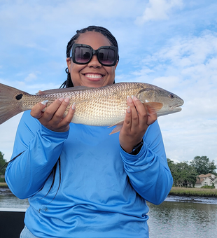 Light tackle magic lands a beautiful redfish!