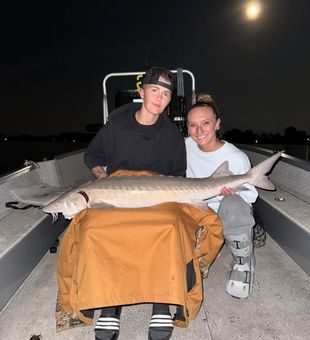 Catch massive sturgeon on Lake St. Clair with guided techniques.