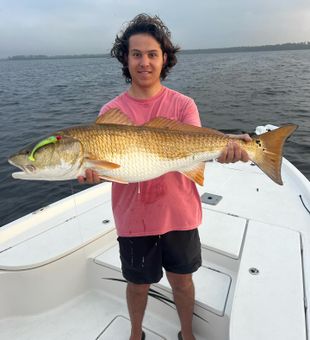 His first trophy Redfish catch on Atlantic Beach