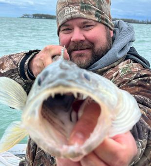Excited catch! Walleye fishing adventure.