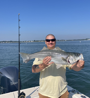 Reeling in a good catch on a beautiful day.