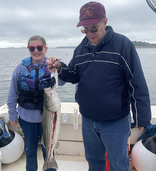 Reeled in a massive striped bass with some deep sea finesse!