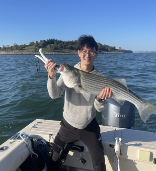 Nice striped bass on light tackle! Clear conditions made for an exciting adventure.