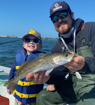 A happy little angler fishing with Captain Nick