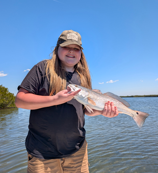 Peaceful day on the water with a fresh catch.