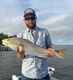 Big redfish reeled in during a clearing afternoon in Milton!