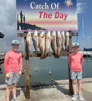 Six Port Aransas redfish making for great fishing memories!