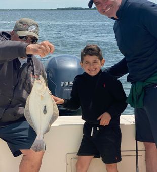 7 yr old with his first fluke