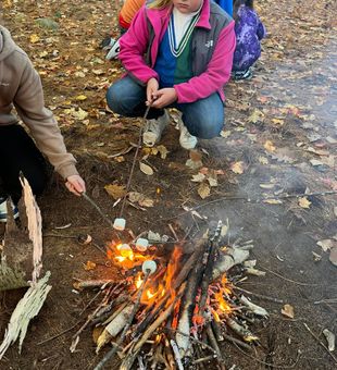 Enjoyable marshmallow roasting.