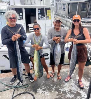 Lively Mahi Mahi and Tuna lineup on a Kona fishing charter
