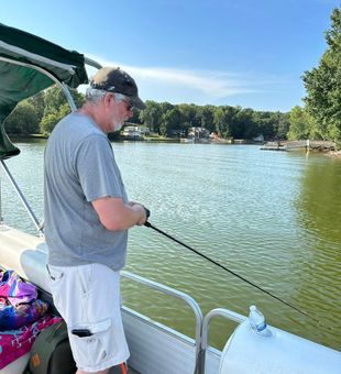 Focused lake bass fishing moment
