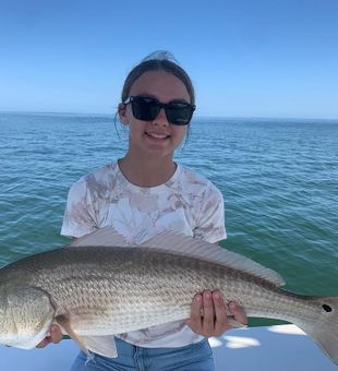 Casting lines along the New Smyrna Beach coast.