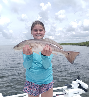 Huge 27-inch redfish landed on a stormy day in Weeki Wachee!
