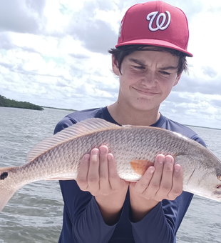 Reeling in the reds with some slick jigging in Weeki Wachee!