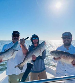 Big redfish catch on a Galveston Bay fishing charter
