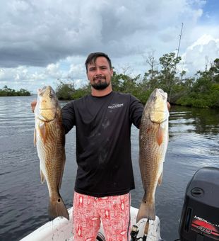 Quality redfish double catch inshore fishing