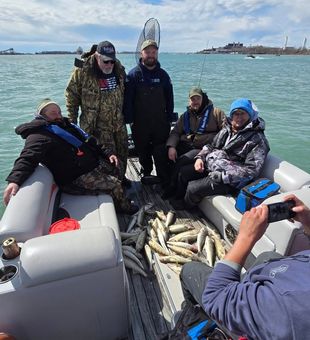 Reeling in a Lake Michigan trout