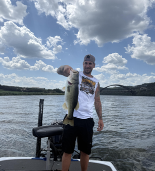 Reeling in a huge Florida Bass at Buchanan Dam - fishing at its best!
