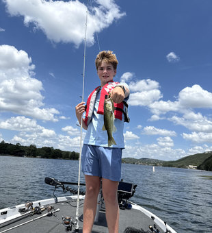 Reeling in the best Florida Bass at Buchanan Dam on a crystal clear day!