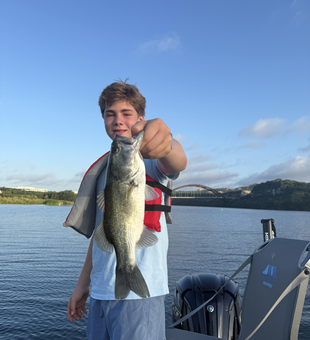 Huge Florida Bass reeled in under clear skies at Buchanan Dam!