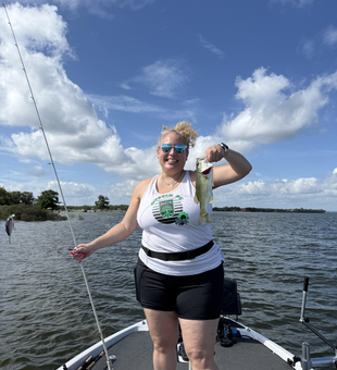 Reeling in the Lone Star State's finest: an 11-inch Florida Bass at Buchanan Dam!